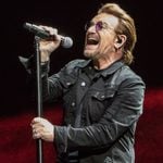 Bono singing during U2's performance at Lucas Oil Stadium in Indianapolis, Indiana on September 10, 2017