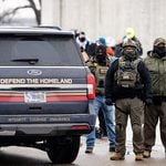 US Government SUV with "Defend The Homeland" "Integrity, Courage, Endurance" written on it as seen in Minneapolis on January 8, 2026