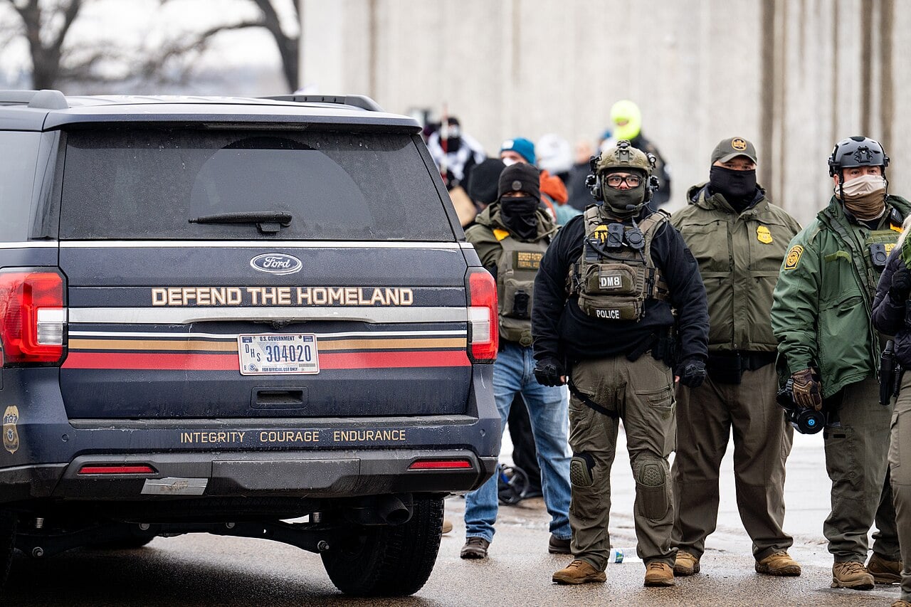US Government SUV with "Defend The Homeland" "Integrity, Courage, Endurance" written on it as seen in Minneapolis on January 8, 2026